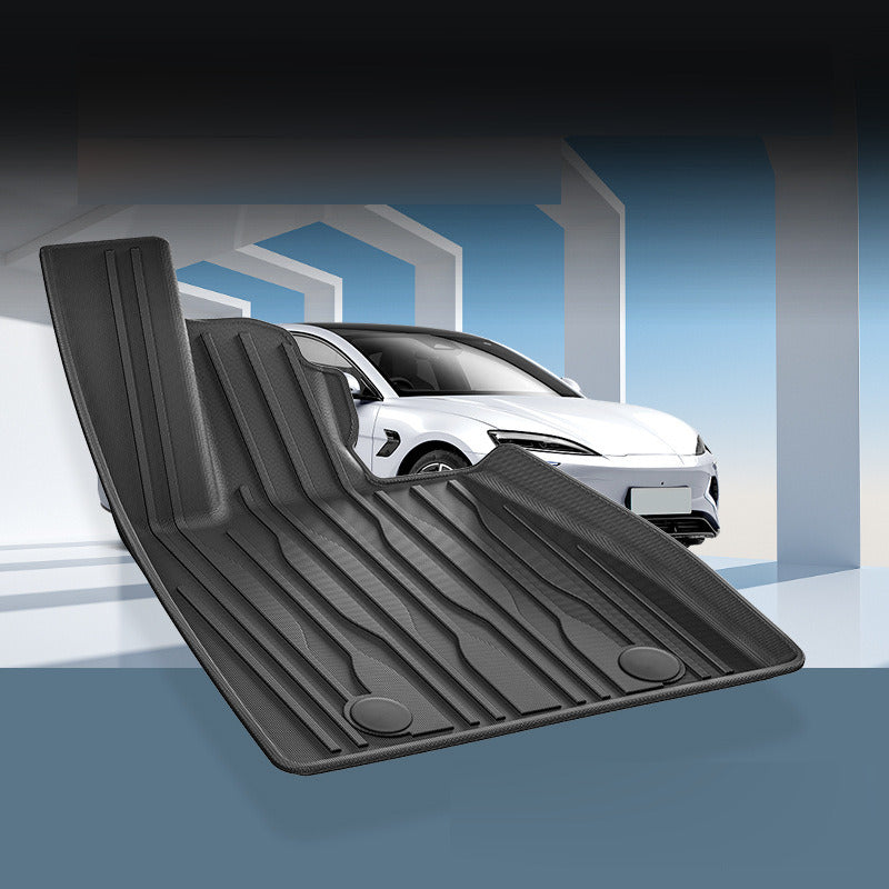 BYD Seal floor mat shown in front of a white BYD Seal