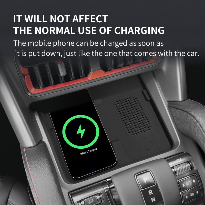 Phone charging wirelessly through the BYD Shark 6 silicone pad