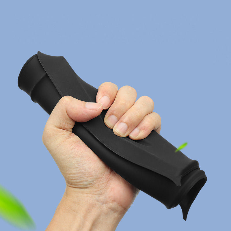 Silicone pad bent by hand to show it is flexible